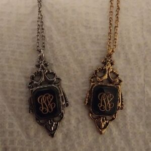 Two vintage monogram necklaces